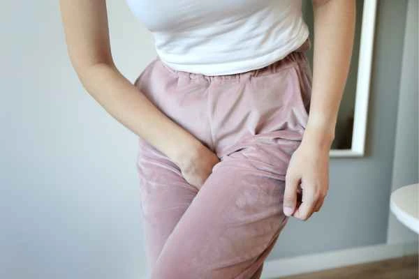 woman struggling with urine incontinence Petersfield
