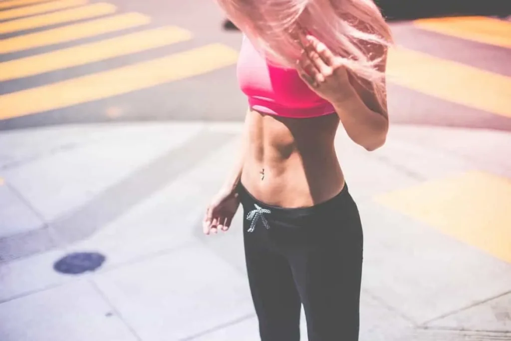 Woman with toned stomach after LA-EMS Body Sculpting Treatment Petersfield 